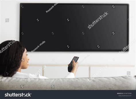 Family Watching Plasma Tv