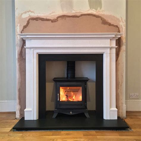 Log Burning Stove With Limestone surround | Log burner living room, Log ...