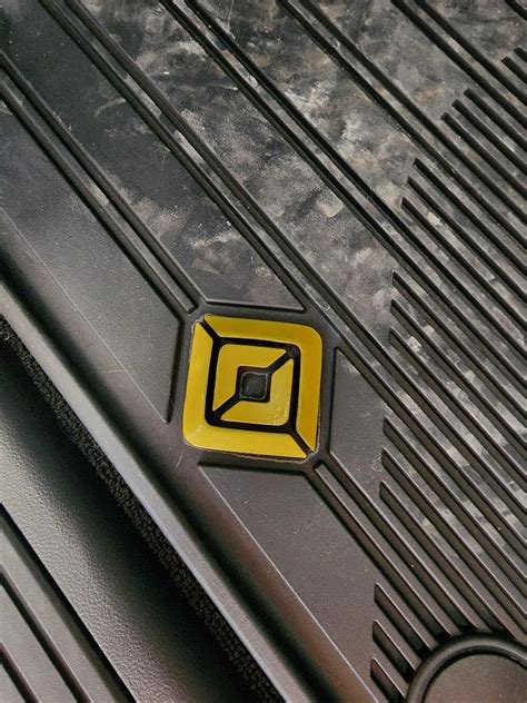 All weather floor mats logos are black | Rivian Forum - R1T R1S R2 R3 ...