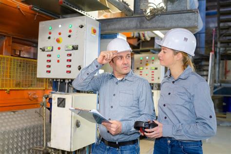 Image result for Workers Operating Machine