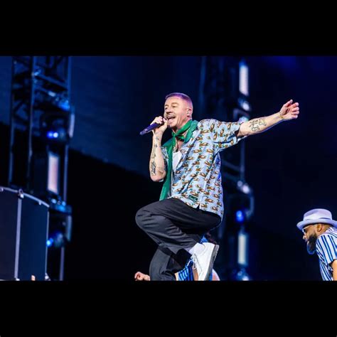 https://www.hotnewhiphop.com/i/v1/765x765-contain-81-auto/2023/11/Macklemore.jpg