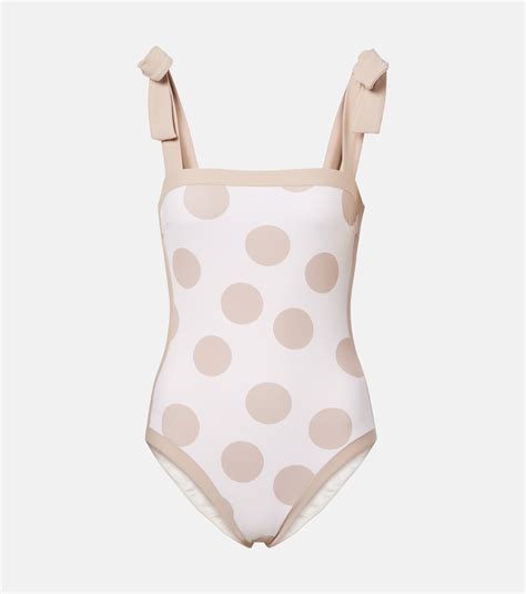 Piper polka-dot swimsuit in beige - Simkhai | Mytheresa