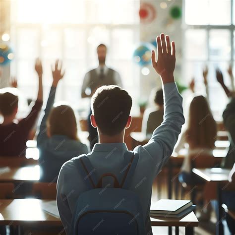 Premium Photo | Young students raising hands in classroom with teacher ...