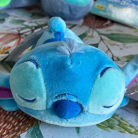 Disney miniature Lilo and stitch teddy, brand-new laying flat in belly ...