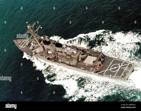 The guided missile destroyer USS JOHN S. MCCAIN (DDG 56) patrols the ...