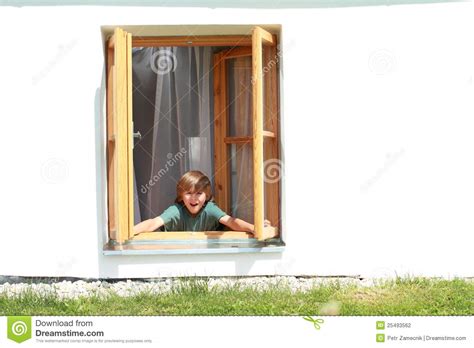 Boy Opening The Window Stock Photography - Image: 25493562