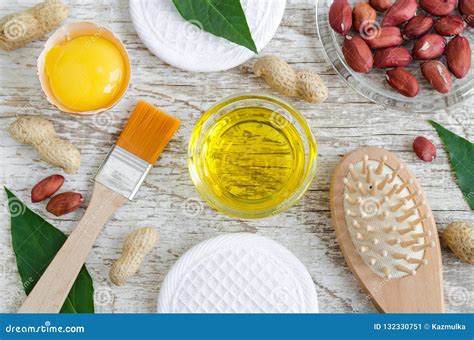 Small Glass Bowl with Peanut Groundnut Oil and Raw Egg Yolk. Natural ...