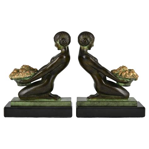 Art Deco style bookends PEGASE signed by Max Le Verrier, winged horses. at 1stDibs