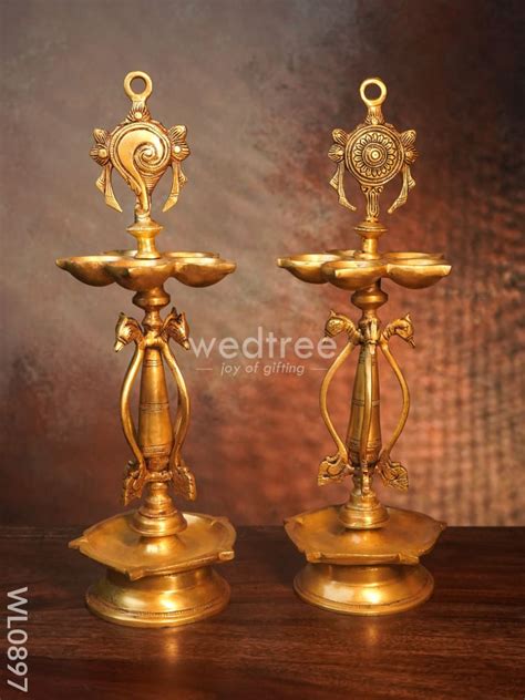 Brass Two Steps Shank Chakra Nama Diya with Peacock Design in the Midd ...
