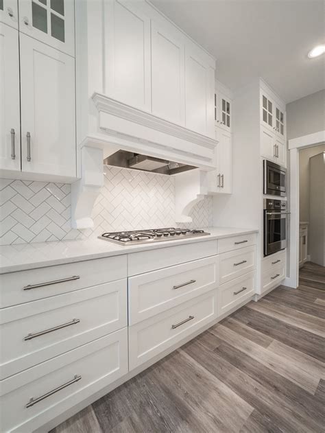 White Kitchen Cabinets With Dark Vinyl Plank Flooring | Floor Roma