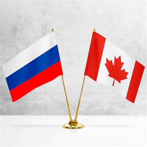 Купить настольные флаги России и Канады за 450 руб.