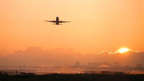 Plane Taking Off Sunrise