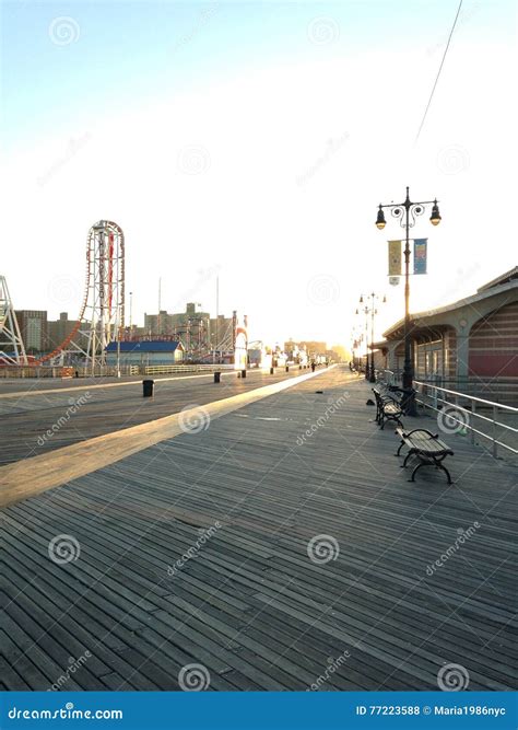 Sunrise on Coney Island Boardwalk. Editorial Stock Photo - Image of ...