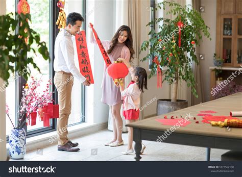 Happy Family Decorating Their House Chinese Stock Photo 1877562130 ...