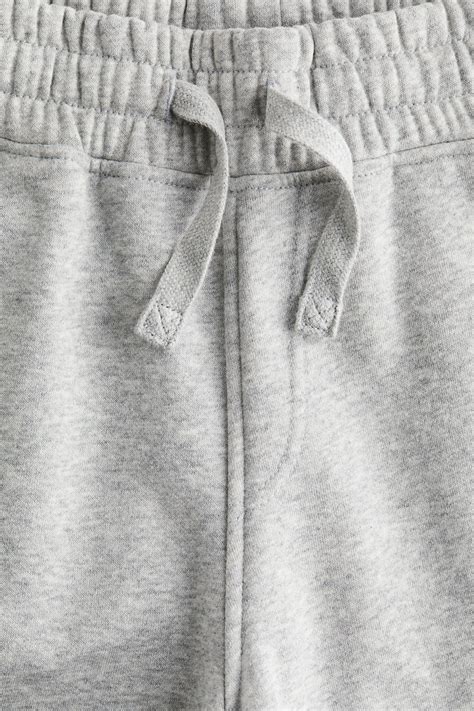 Wide brushed-inside joggers - Light grey marl - Kids | H&M IN