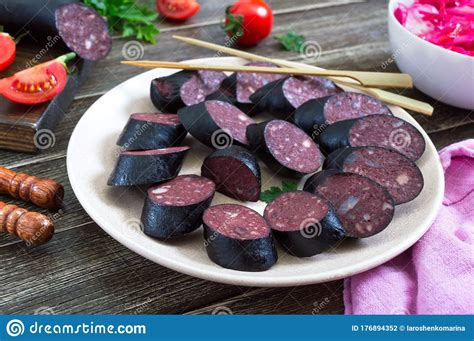 Morsilla - Blood Sausage. Pieces of Spanish Black Pudding on a Plate ...