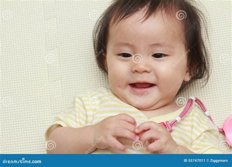 Smiling Japanese baby girl stock image. Image of copy - 55747011