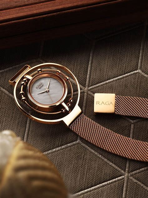 Titan Women White Brass Mother of Pearl Dial & Rose Gold Toned ...