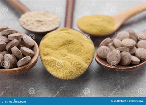 Different Types of Brewer S Yeast on Grey Table, Closeup Stock Photo ...
