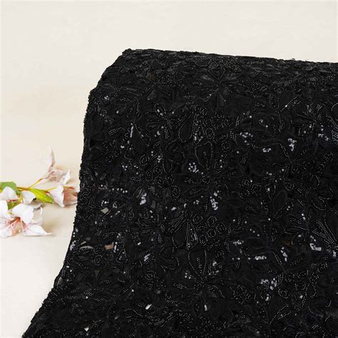 Buy Black Cutwork Embroidery Net Fabric at TradeUNO – TradeUNO Fabrics