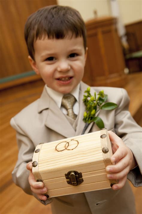 Most precious ring bearer ever and cute idea for carrying the ring ...