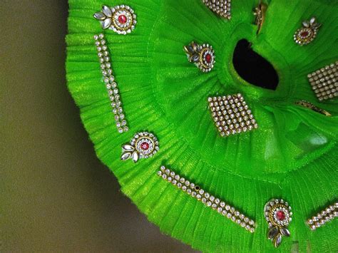 Paushak Boutique Golden Embroidered Red Stone Applique Sewing Booty ...