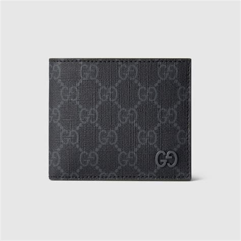 Dark green interior bi-fold wallet in black GG Supreme | GUCCI® IT