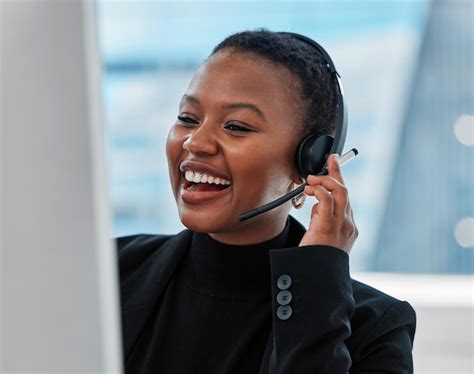 Call center smile and black woman consultant in office for online crm ...