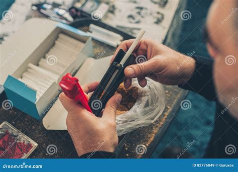 Smoker Man Roll Tobacco Cigarettes Using Rolling Machine Stock Image ...