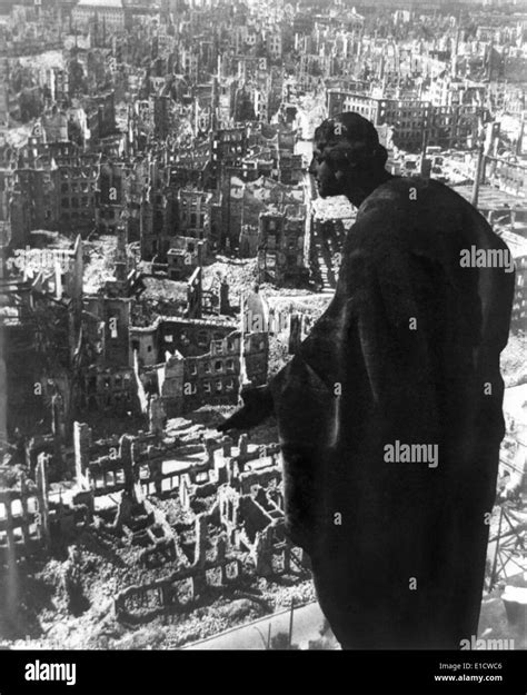 Statue overlooking Dresden, Germany, after fire bombing during World War 2. View of the ...