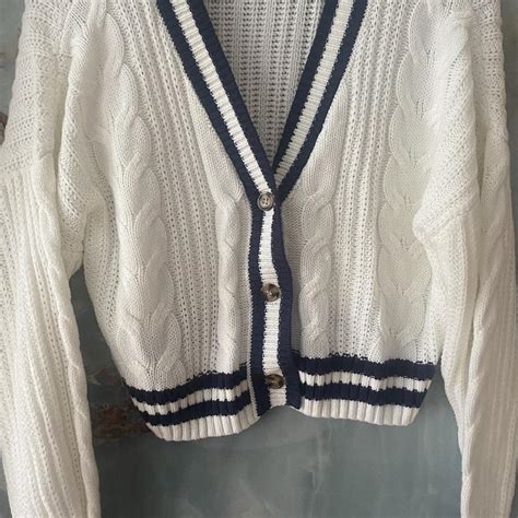 Medium navy and white varsity cropped knitted... - Depop