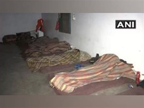 Homeless in Delhi take refuge in night shelters to cope with chilly weather