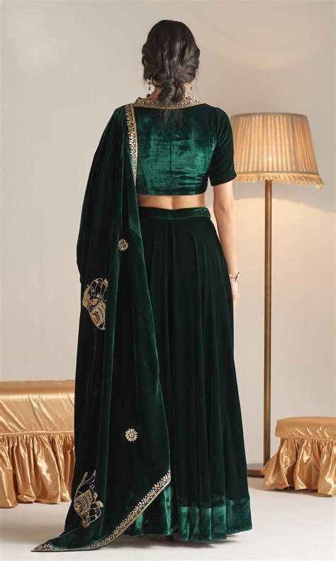 Khizaan Embroidered Emerald Green velvet Lehenga with blouse and shawl ...