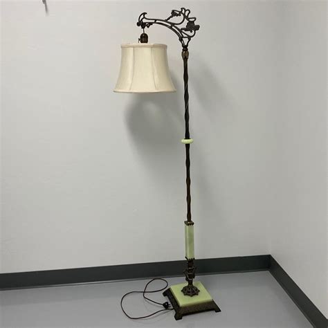 -7- URANIUM | Intricate Heavy Floor Lamp | EstateSales.org