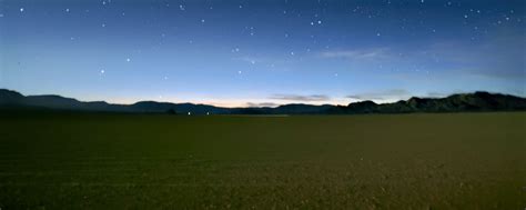Download wallpaper 2560x1024 sky, field, mountains, starry sky, dark ...
