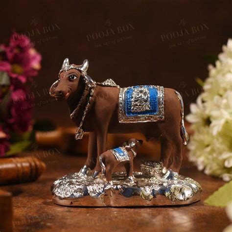 Buy Kamdhenu Cow Idol Brown Online in India - Mypoojabox.in