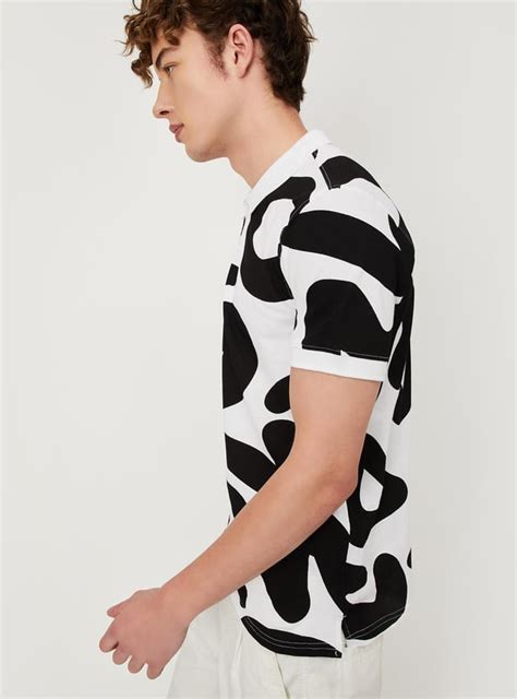 Buy Men Slim Fit Printed Polo T-shirt Online at just Rs. 799.0 ...