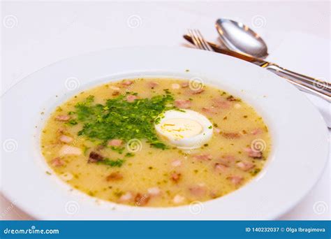 Traditional Polish White Borscht - Zurek, Sour Soup with White Sausages ...