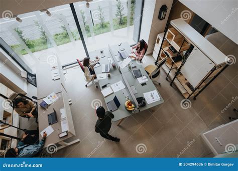 Elevated view of a busy open plan office.