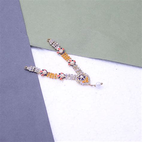Flower Design Orange Stone Decorated Haar For Idols – MyKanha.com