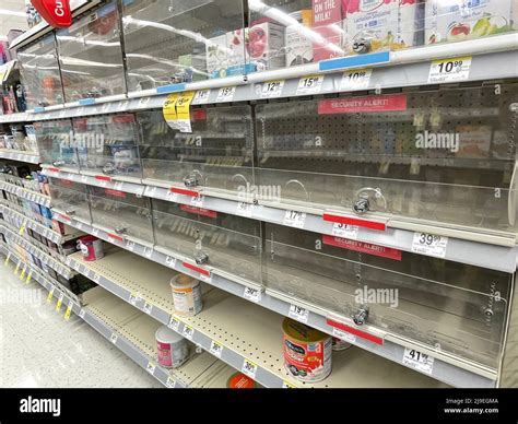 A baby formula display sits nearly empty at a Target store in Orlando.