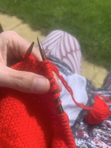 If I’m adding in a new ball of the same colour, I tend to just knit the tails together with the ...