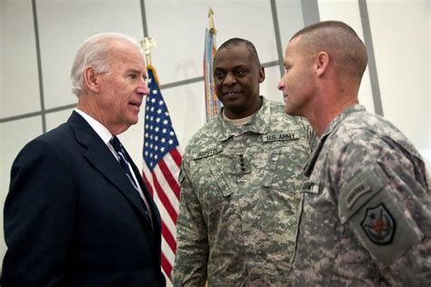 U.S. Vice President Joe Biden talks with U.S. Army Gen. Lloyd J. Austin ...