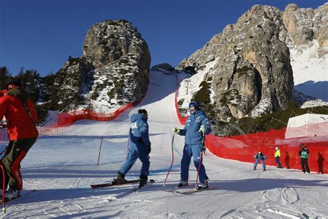 United States' Lindsey Vonn crashes into a gate during an alpine ski women's downhill race, at the 2026 Winter Olympics, in Cortina d'Ampezzo, Italy, Sunday, Feb. 8, 2026. (AP Photo/Jacquelyn Martin)