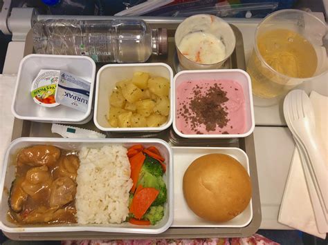 Cathay Pacific, Economy Class | Airline Review - Beauty and the Being