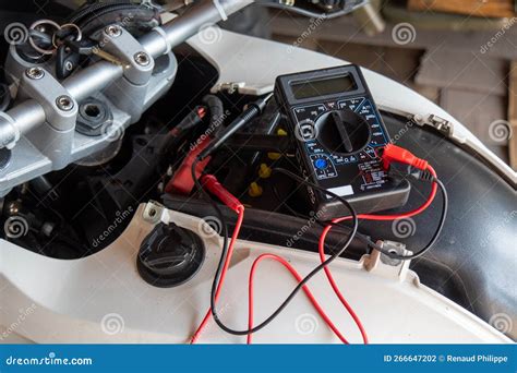 Image result for Using a Multimeter to Check Motorcycle Battery