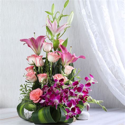 Order Lilies Orchids And Roses In Basket online | Get same day delivery ...