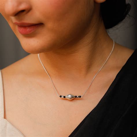 Buy Silver Mangalsutra with Dholki Motif at House of Aadyaa