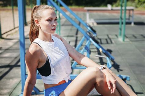 Girl in sports set slowly undresses and sits on the dick