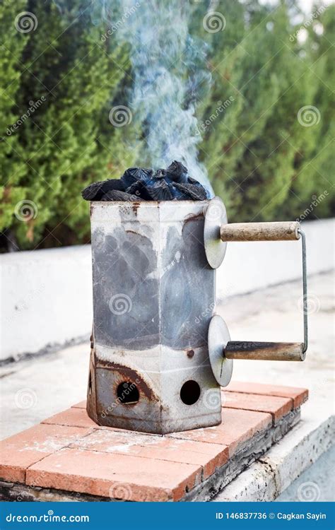 Smoking Charcoal Chimney Starter Bucket for Barbecue Stock Photo ...